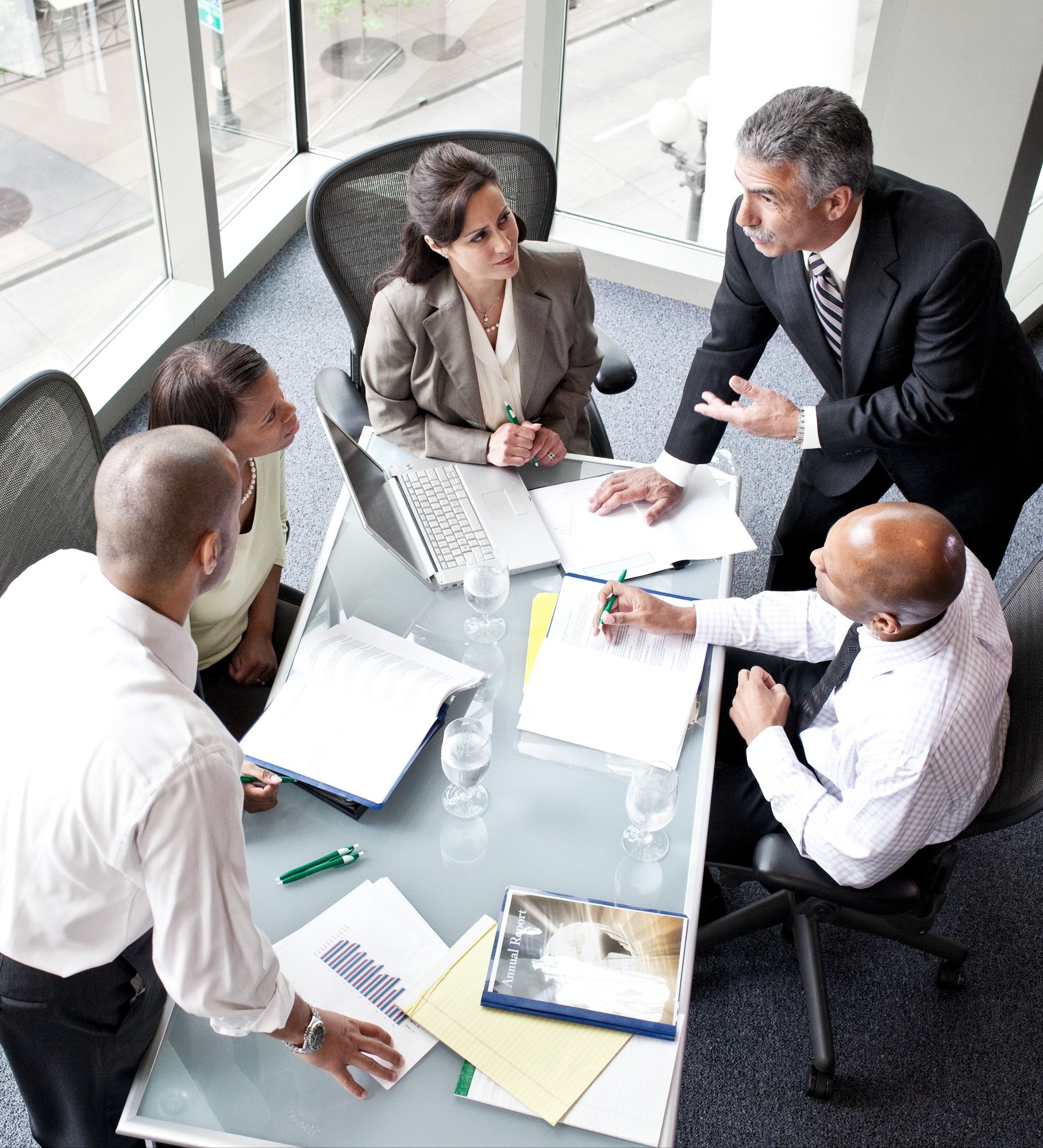 male-and-female-business-people-in-a-meeting-at-a-2023-11-27-04-56-49-utc